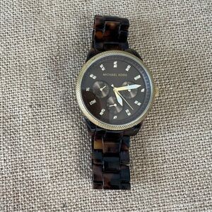 Michael Kors brown tortoise shell plastic link gold tone watch round face